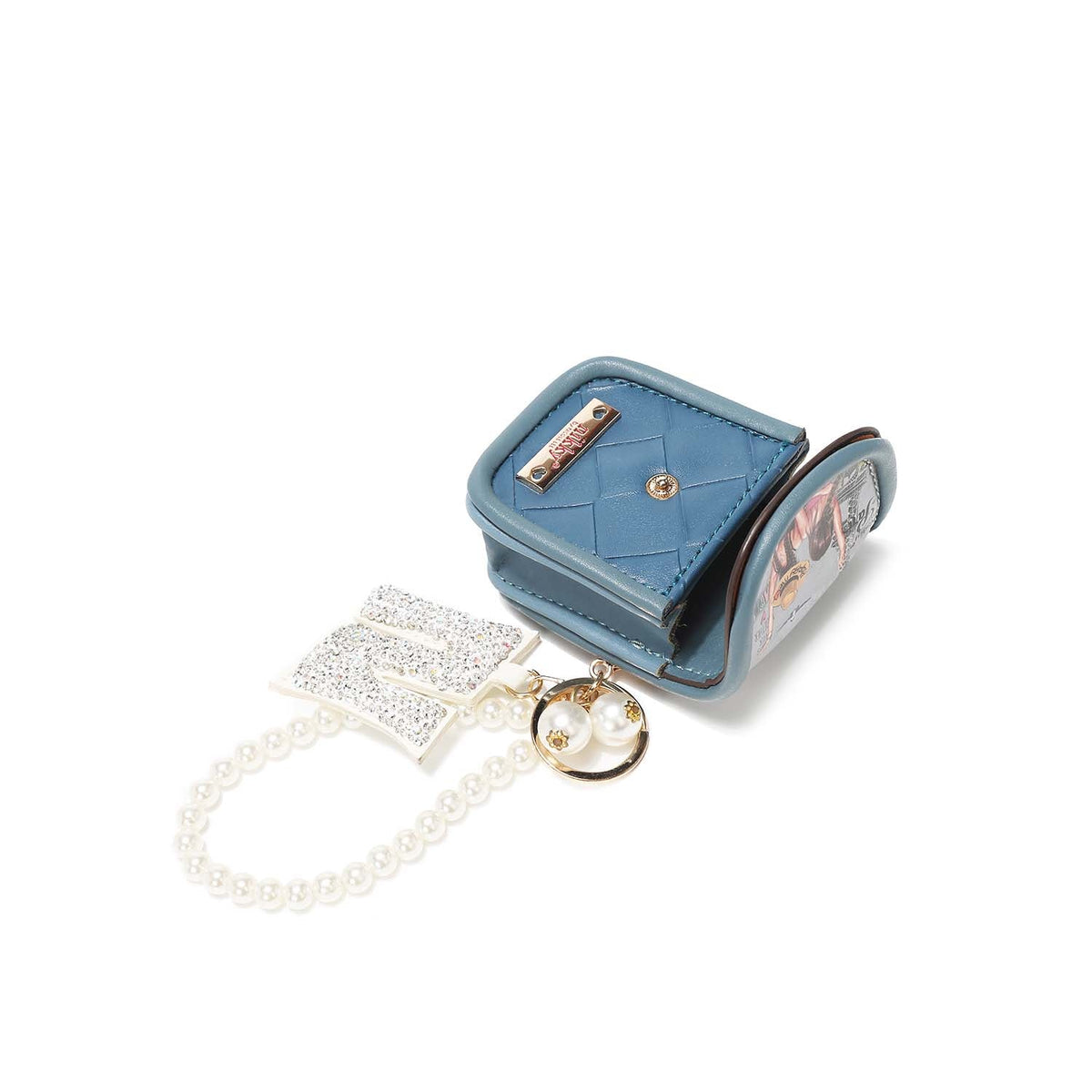 LLAVERO CON PORTA AUDIFONOS Y PULSERA DE PERLAS NIKKY-3